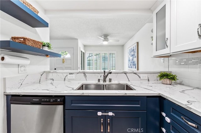 1442 Brett Pl Unit 31, San Pedro, CA 90732 - kitchen with stainless steel dishwasher, blue cabinetry, open shelves, white cabinetry, and a textured ceiling