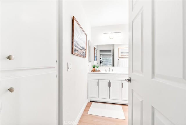 1442 Brett Pl Unit 31, San Pedro, CA 90732 - bathroom featuring vanity and wood finished floors