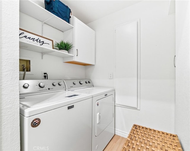 1442 Brett Pl Unit 31, San Pedro, CA 90732 - washroom featuring cabinet space, separate washer and dryer, and light wood-style floors