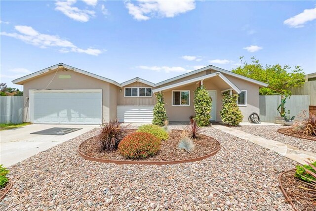 4054 Lewis St, Oceanside, CA 92056 - ranch-style home featuring driveway, stucco siding, and a garage