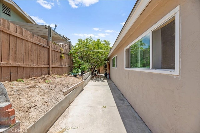 4054 Lewis St, Oceanside, CA 92056 - view of home's exterior with stucco siding and a patio