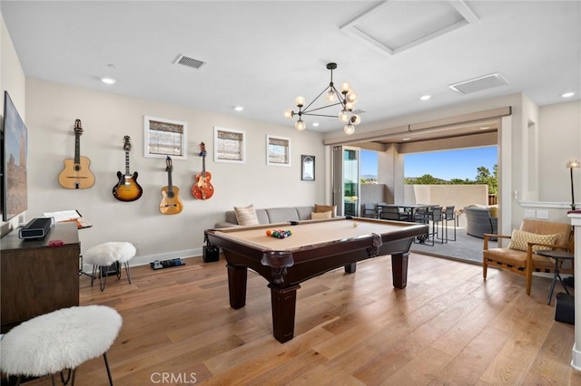 131 Spiral, Irvine, CA 92618 - playroom featuring light wood finished floors, recessed lighting, billiards, attic access, and a chandelier