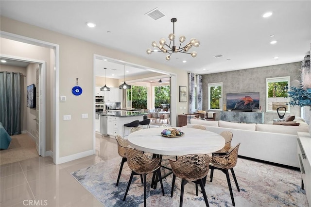 131 Spiral, Irvine, CA 92618 - dining area featuring recessed lighting, healthy amount of natural light, and a chandelier