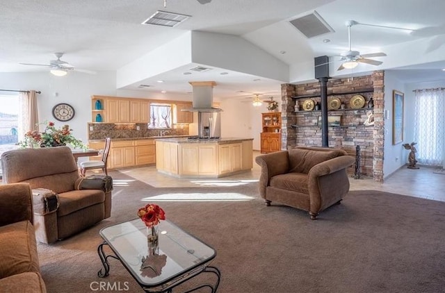 61975 La Brisa Dr, Joshua Tree, CA 92252 - living room featuring ceiling fan and vaulted ceiling