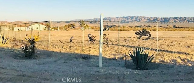 61975 La Brisa Dr, Joshua Tree, CA 92252 - view of yard with a mountain view and a view of rural / pastoral area