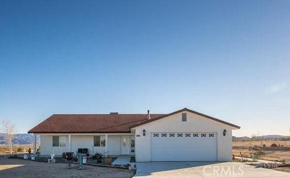 61975 La Brisa Dr, Joshua Tree, CA 92252 - ranch-style home with a garage and driveway