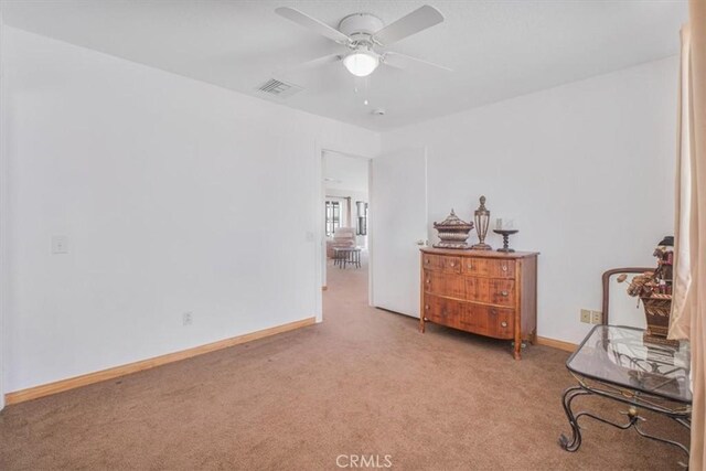 61975 La Brisa Dr, Joshua Tree, CA 92252 - living area featuring carpet and a ceiling fan
