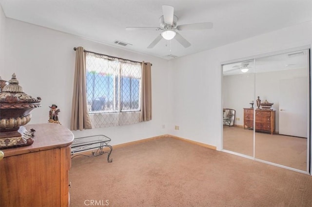 61975 La Brisa Dr, Joshua Tree, CA 92252 - sitting room with carpet flooring and a ceiling fan