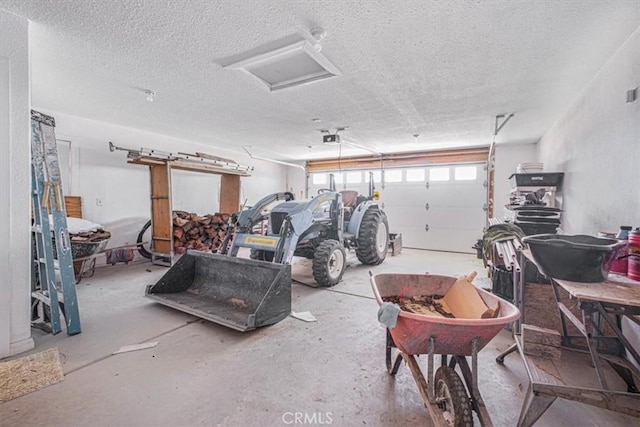 61975 La Brisa Dr, Joshua Tree, CA 92252 - garage featuring a garage door opener