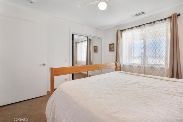 61975 La Brisa Dr, Joshua Tree, CA 92252 - carpeted bedroom featuring a closet and ceiling fan