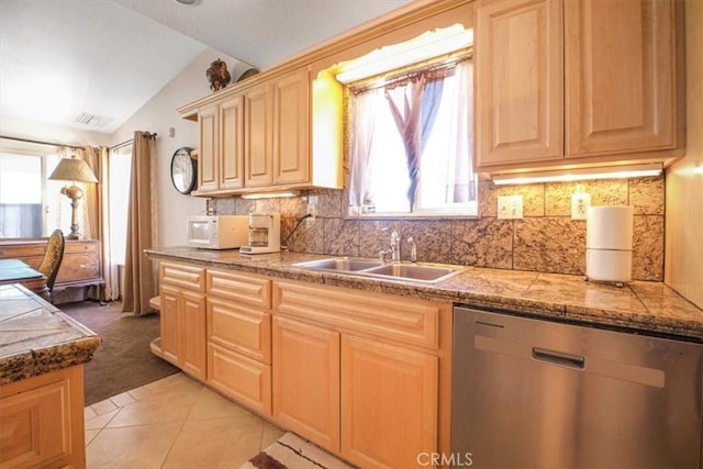 61975 La Brisa Dr, Joshua Tree, CA 92252 - kitchen featuring dishwasher, vaulted ceiling, light brown cabinets, white microwave, and light tile patterned flooring