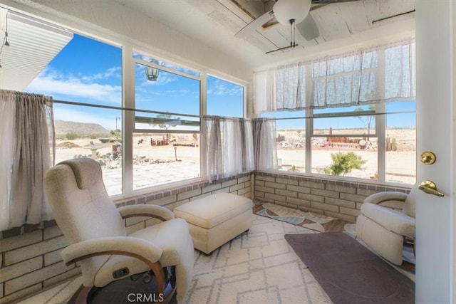 61975 La Brisa Dr, Joshua Tree, CA 92252 - sunroom featuring plenty of natural light and a mountain view