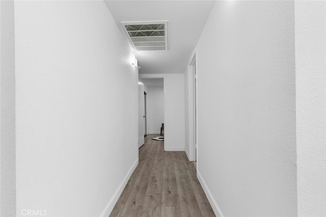 8801 Cedros Ave Unit 7, Panorama City, CA 91402 - hall featuring wood finished floors and baseboards