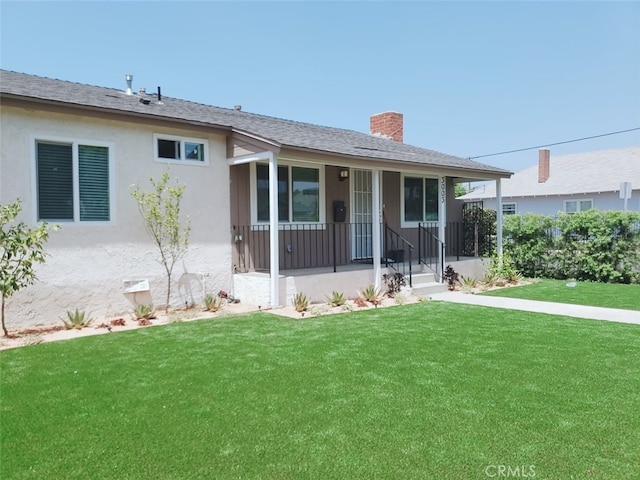 3003 Dalton Ave, Los Angeles, CA 90018 - view of front of house with a chimney, a front yard, covered porch, and stucco siding