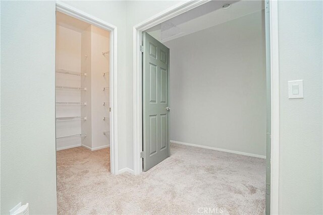 11935 Silver, Jurupa Valley, CA 91752 - hallway with carpet and baseboards