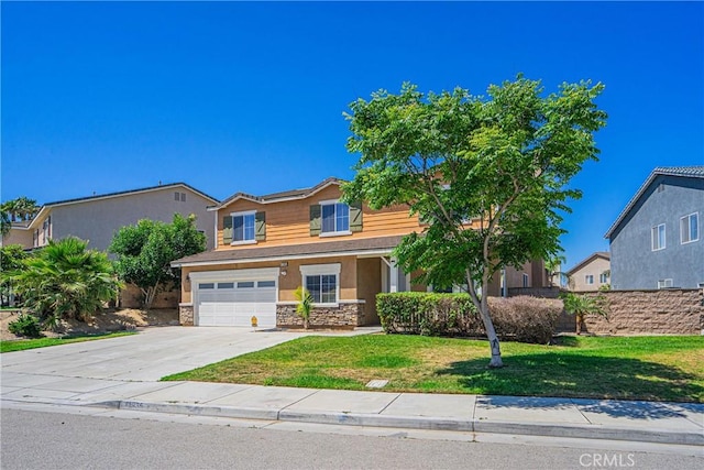11935 Silver, Jurupa Valley, CA 91752 - view of front of home with stone siding, driveway, an attached garage, and a front yard