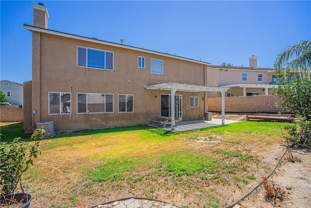 11935 Silver, Jurupa Valley, CA 91752 - back of property featuring a pergola, a patio area, a fenced backyard, and stucco siding