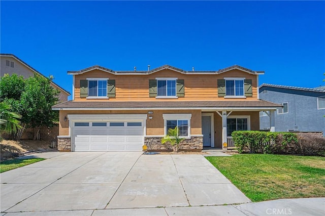 11935 Silver, Jurupa Valley, CA 91752 - traditional home with stone siding, stucco siding, an attached garage, driveway, and a front yard