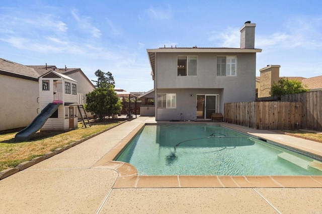 8041 Lomand Ct, Sacramento, CA 95828 - view of swimming pool with a fenced backyard, a playground, and a patio area