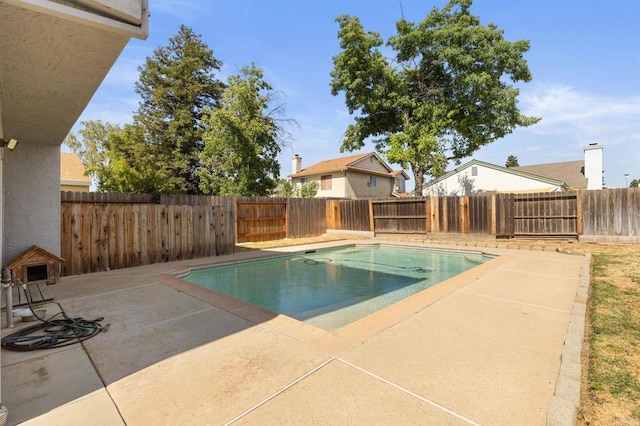8041 Lomand Ct, Sacramento, CA 95828 - view of pool with a patio area and a fenced backyard