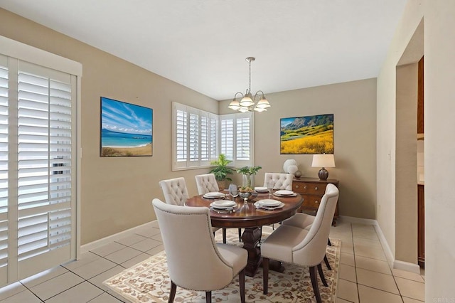 8041 Lomand Ct, Sacramento, CA 95828 - dining space featuring a chandelier and light tile patterned floors