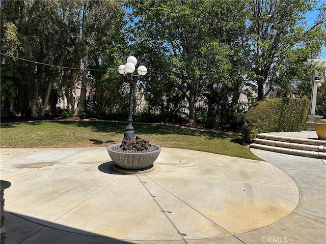 1073 Peter Christian Cir, Corona, CA 92881 - view of patio featuring an outdoor fire pit