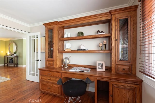 1915 Volk Ave, Long Beach, CA 90815 - home office with wood finished floors, built in study area, and ornamental molding