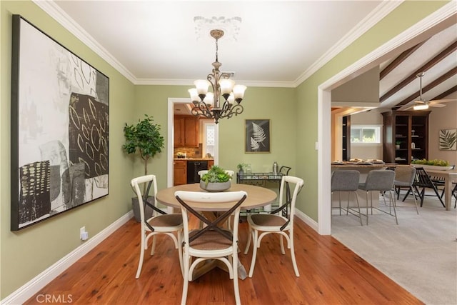 1915 Volk Ave, Long Beach, CA 90815 - dining space with a chandelier, crown molding, and wood finished floors