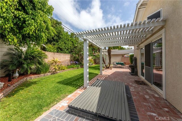 1915 Volk Ave, Long Beach, CA 90815 - fenced backyard with a pergola and a patio