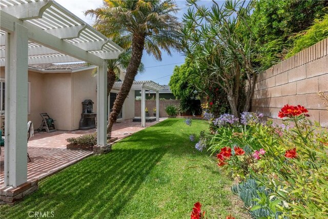 1915 Volk Ave, Long Beach, CA 90815 - fenced backyard featuring a pergola and a patio