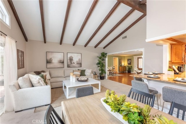 1915 Volk Ave, Long Beach, CA 90815 - living area with beamed ceiling, high vaulted ceiling, and light wood-type flooring