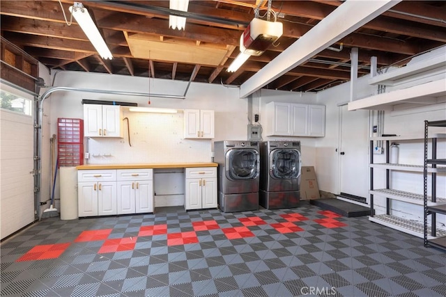 1915 Volk Ave, Long Beach, CA 90815 - laundry area with cabinet space, separate washer and dryer, and dark floors