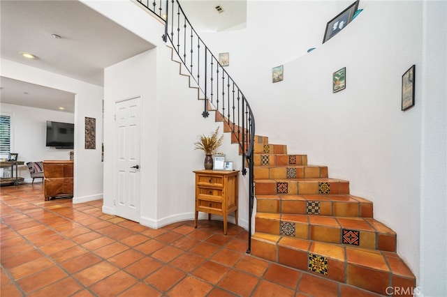 30050 Cabo Del Oeste, Highland, CA 92346 - stairs featuring tile patterned floors and recessed lighting