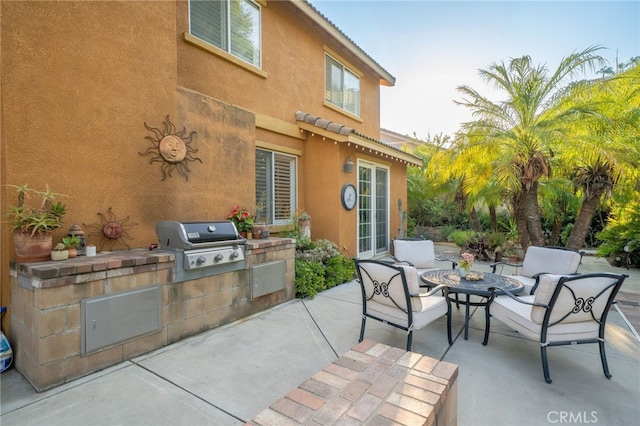 30050 Cabo Del Oeste, Highland, CA 92346 - view of patio featuring exterior kitchen