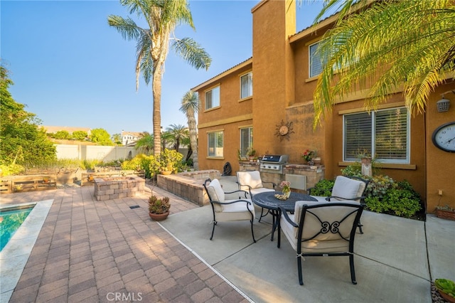 30050 Cabo Del Oeste, Highland, CA 92346 - view of patio featuring exterior kitchen and outdoor dining space