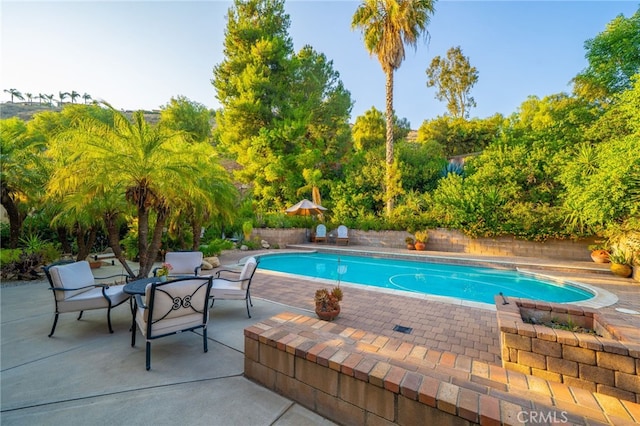 30050 Cabo Del Oeste, Highland, CA 92346 - view of swimming pool with a patio area