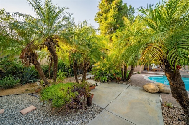 30050 Cabo Del Oeste, Highland, CA 92346 - outdoor pool featuring a patio area