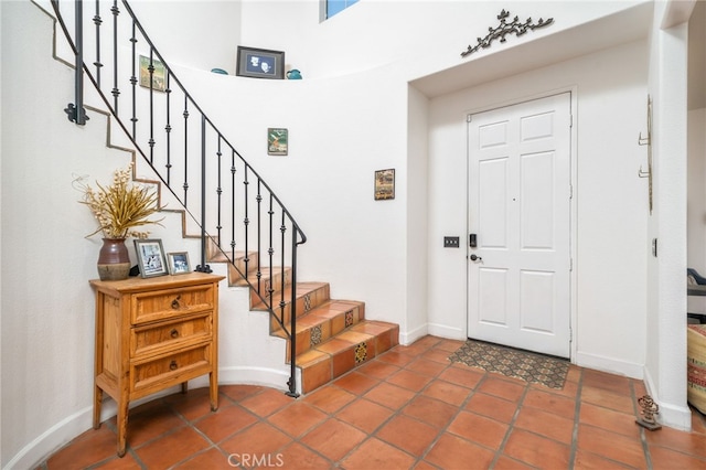 30050 Cabo Del Oeste, Highland, CA 92346 - foyer entrance featuring stairs and tile patterned flooring