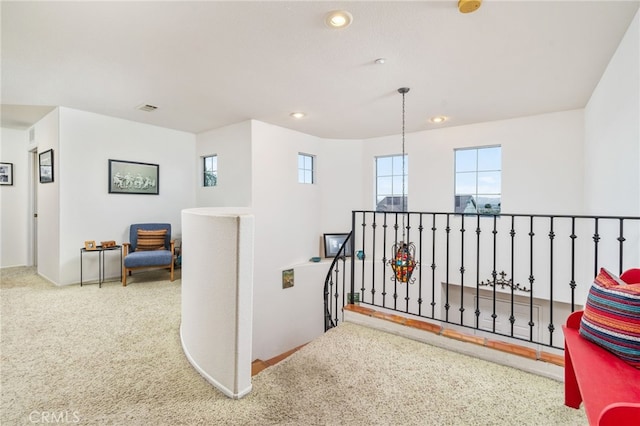 30050 Cabo Del Oeste, Highland, CA 92346 - hallway with an upstairs landing, recessed lighting, and carpet