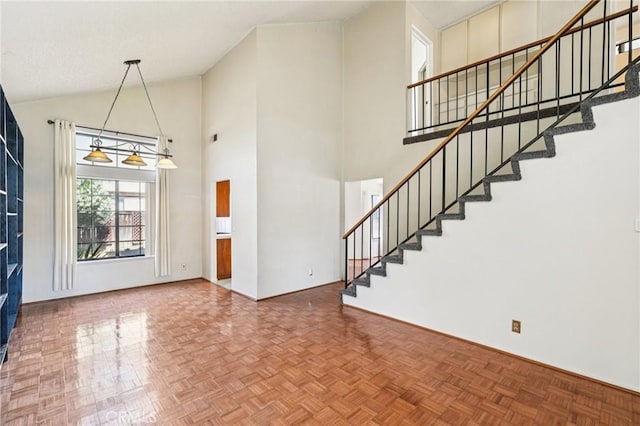 1497 Ruby Dr, Perris, CA 92571 - entrance foyer featuring high vaulted ceiling and stairway