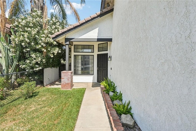 1497 Ruby Dr, Perris, CA 92571 - doorway to property with stucco siding and a tile roof