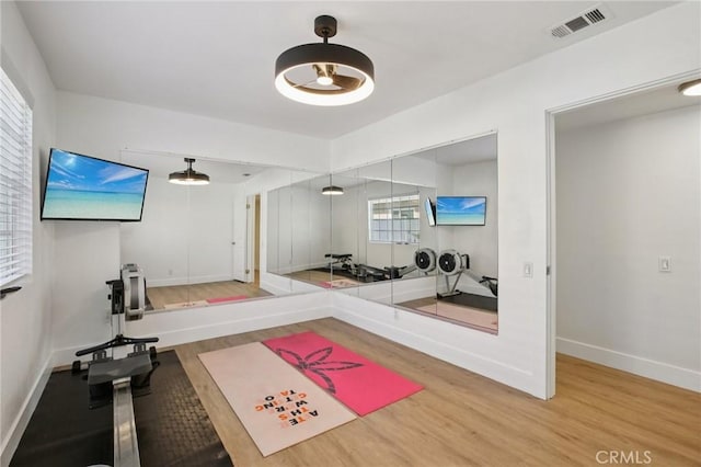 22832 Larkin St, Lake Forest, CA 92630 - exercise area featuring wood finished floors and baseboards