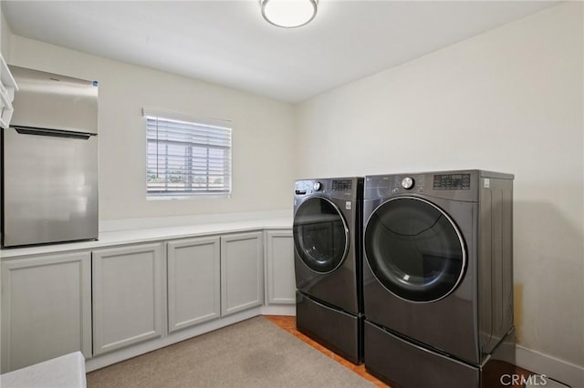 22832 Larkin St, Lake Forest, CA 92630 - laundry room with independent washer and dryer and cabinet space