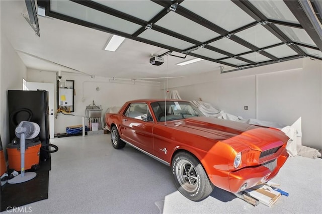 22832 Larkin St, Lake Forest, CA 92630 - garage with a garage door opener and tankless water heater