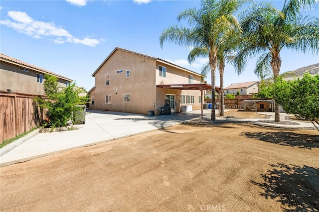 25969 Magnifica Ct, Moreno Valley, CA 92551 - rear view of property with a patio and stucco siding
