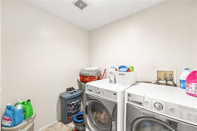 25969 Magnifica Ct, Moreno Valley, CA 92551 - laundry area with separate washer and dryer and baseboards