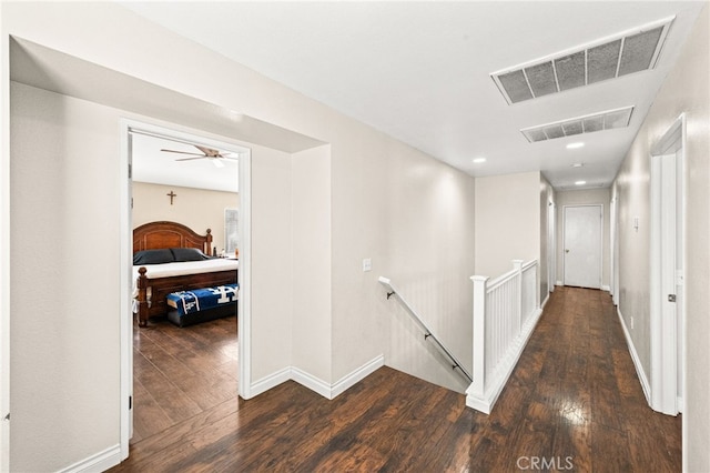 25969 Magnifica Ct, Moreno Valley, CA 92551 - hall featuring an upstairs landing, dark wood-style flooring, and recessed lighting