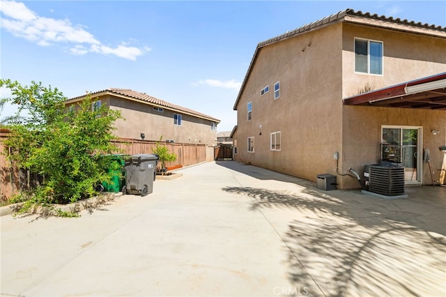 25969 Magnifica Ct, Moreno Valley, CA 92551 - view of side of property with stucco siding and a patio