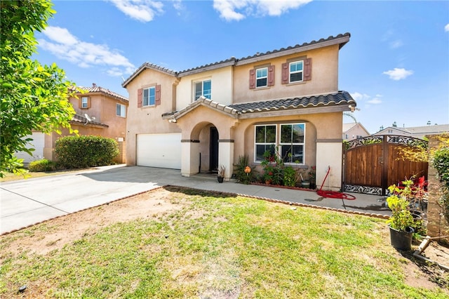 25969 Magnifica Ct, Moreno Valley, CA 92551 - mediterranean / spanish-style house featuring an attached garage, a tiled roof, stucco siding, driveway, and a gate