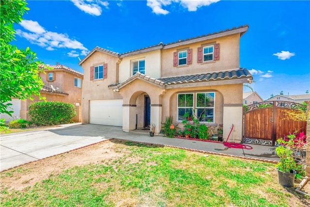 25969 Magnifica Ct, Moreno Valley, CA 92551 - mediterranean / spanish-style house featuring a garage, stucco siding, a tiled roof, and driveway